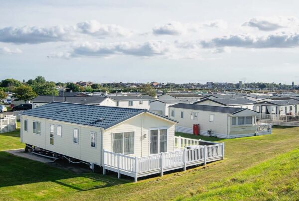 Mobile Home Park Insurance - Landscape View of a Row of Mobile Homes in a Clean and Newly Developed Mobile Home Park on a Sunny Day